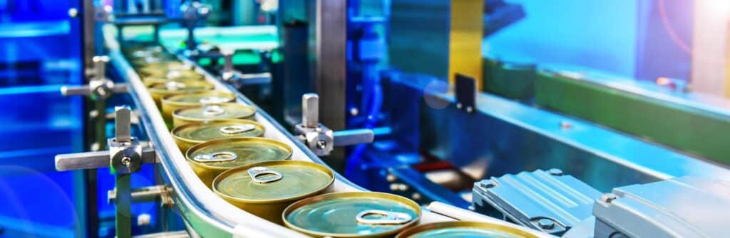 aluminum cans on a production line at a manufacturing facility